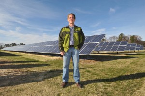 Trey Hill, Partner, Harborview Farms, stands in front of the 200 kW solar array at the Sustainable Agriculture Celebration at Harborview Farms on Dec. 6, 2012 in Rock Hall, Md. Harborview Farms is one of the largest and most sustainably driven farming operations in Maryland. (Larry French/AP Images for DuPont)