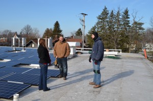 Solar Builder editor Kelly Pickerel talks with Bold Alternatives installers at Baldwin Wallace University.